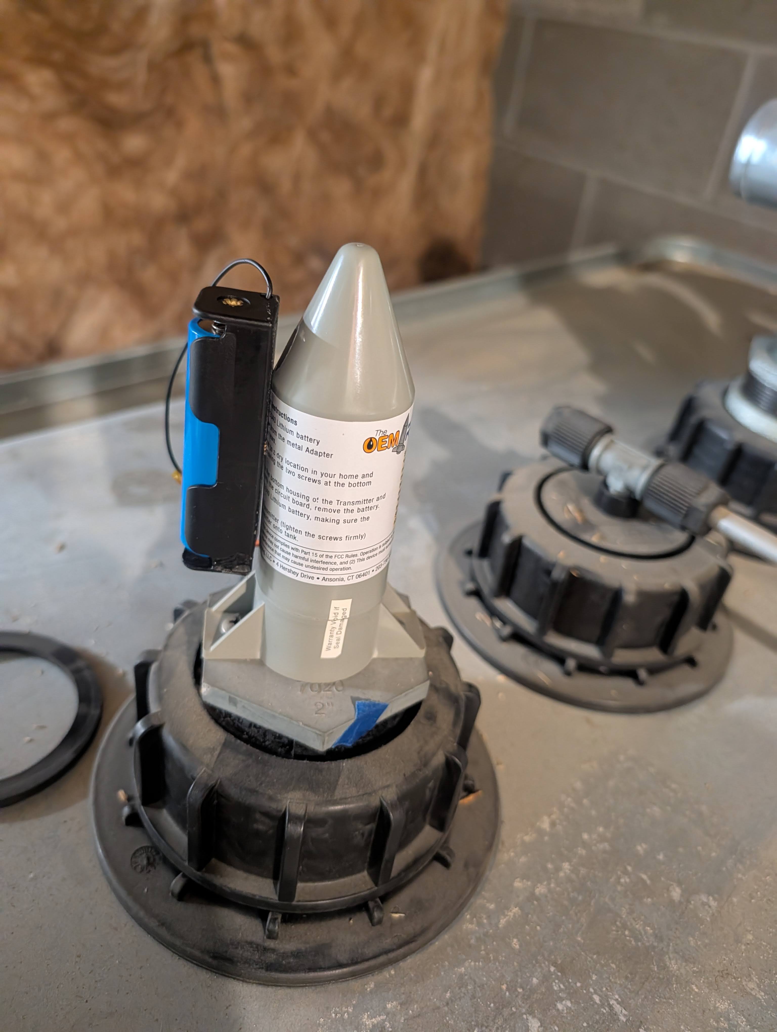 The device installed and operating on my tank with the high-capacity 18650 battery installed.
